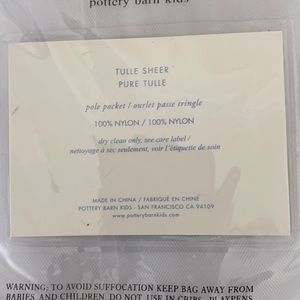 Pottery barn sheer tulle drapes. Still in package